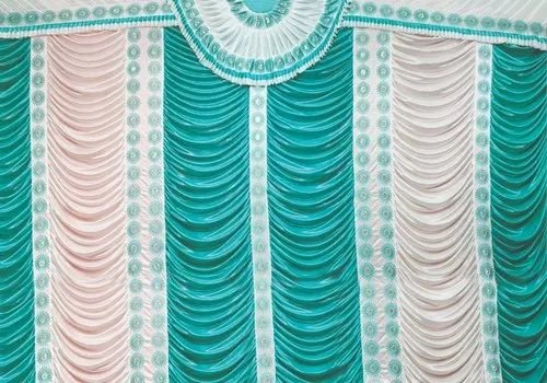 Teal, pink and white draped stage backdrop